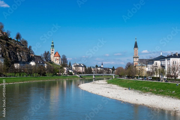 Fototapeta View of Salzburg along the Salzach River in Austria