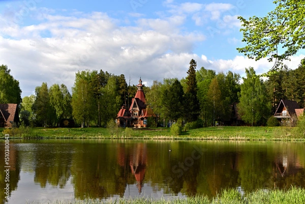 Fototapeta Beautiful Berendey's tower in a forest park area.