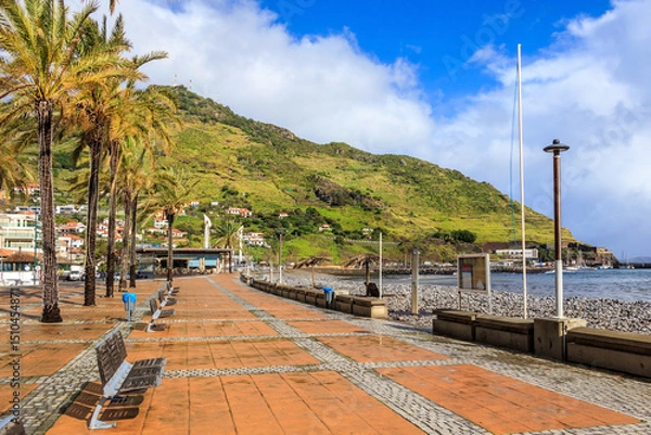 Fototapeta View of embankment in sunny day in Machico, Madeira, Portugal