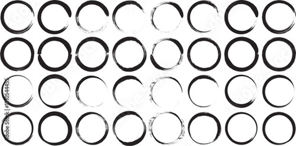 Fototapeta Set of black grunge circles shapes on a white background. Paint brush stamp collection. Vector brush circle. Grunge round shape set.