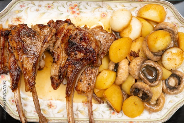 Fototapeta top view homestyle pan-seared lamb chops with mushrooms and potatoes