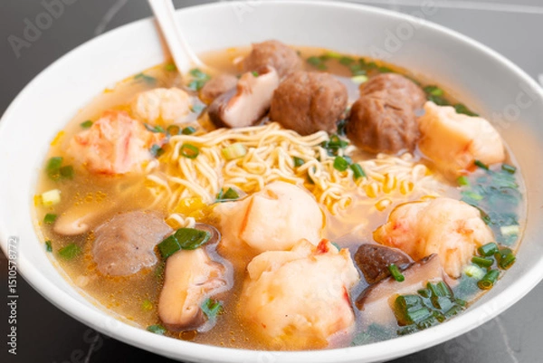 Fototapeta angle view bowl of ChaoZhou beef offal and various seafood ingredients at horizontal composition
