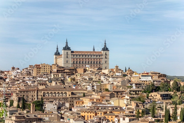 Obraz View of Toledo with the Alcazar rising above the city, surrounded by narrow streets and traditional buildings in this historic Spanish imperial town