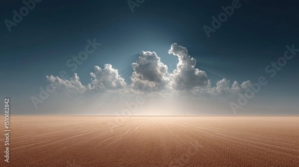 Obraz A wide desert landscape illuminated by intense sunlight, with heat waves visible above the sand and a few scattered clouds hinting at changing weather patterns