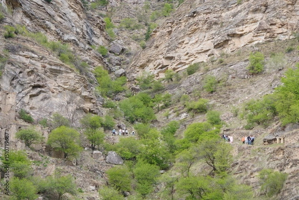 Fototapeta A group of tourists in a mountainous area.