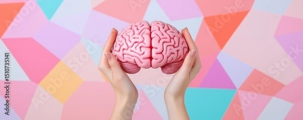 Fototapeta Hands Holding Brain on a Vibrant Geometric Background. Structured thinking and the dynamic nature of the human mind.