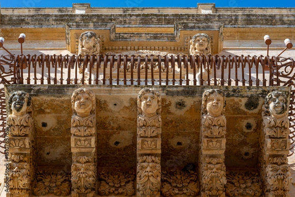 Obraz Angel faces on a corbel supporting a balcony