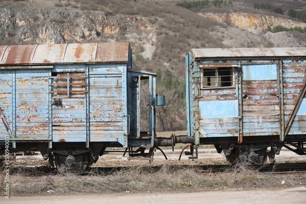 Obraz Abandoned old railway wagons at station, old train wagons in an abandoned station