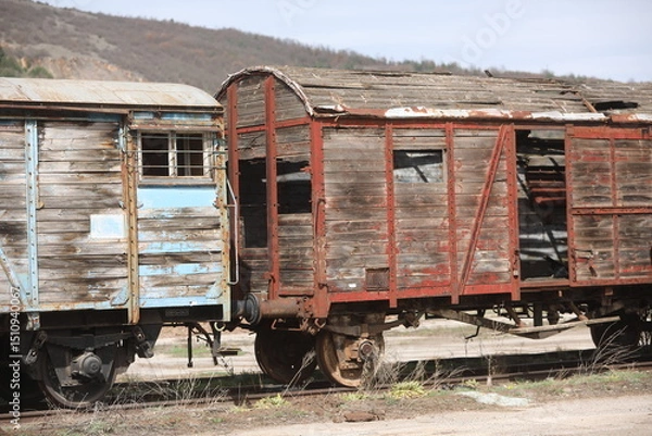 Obraz Abandoned old railway wagons at station, old train wagons in an abandoned station