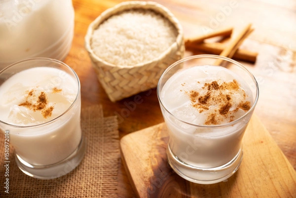 Fototapeta Agua de Horchata. Also known as horchata de arroz, it is one of the traditional fresh waters (aguas frescas) in Mexico, it is made with fresh water, rice and cinnamon.