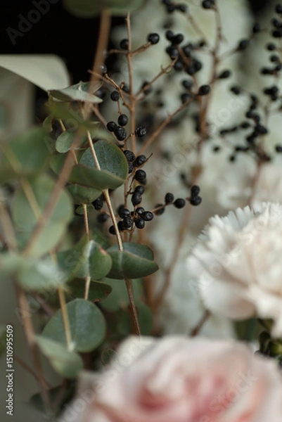Obraz Close-up of floral arrangement with black berries, eucalyptus leaves, and soft pastel flowers. Perfect for wedding design, botanical prints, rustic cards, and natural lifestyle visuals.