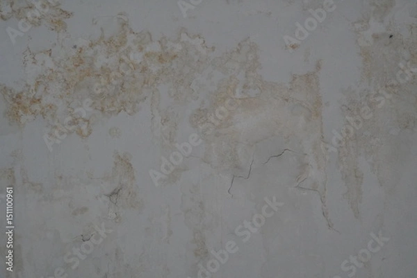 Fototapeta Weathered Concrete Wall with Cracks and Patches of Discoloration, Textured Surface