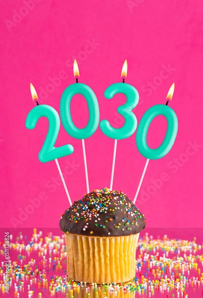 Fototapeta Happy New Year 2030 - Candles in the form of lit numbers