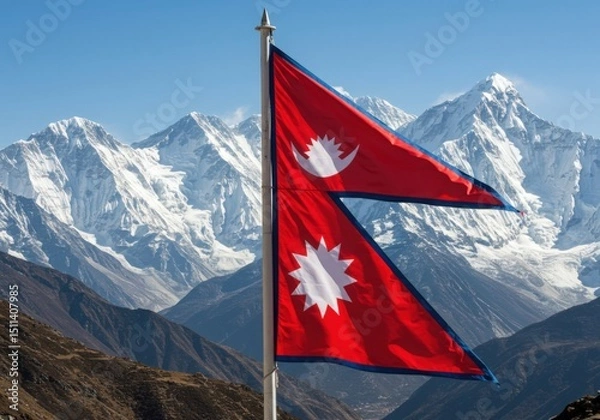 Fototapeta Waving Unique Nepali Flag Symbolizing Himalayas Against the Majestic Peaks of Mount Everest Range