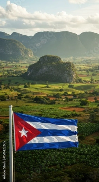 Fototapeta Waving Cuban Flag Symbolizing Caribbean Resilience Amidst the Unique Mogotes of the Viñales Valley
