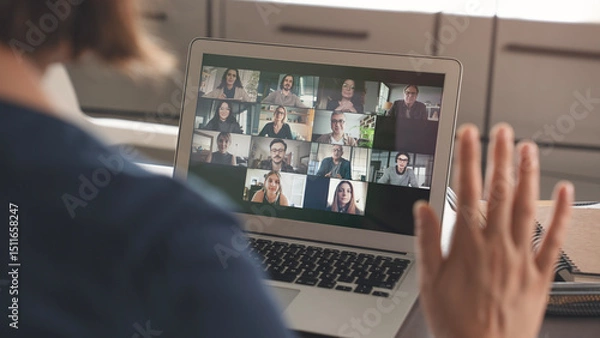 Fototapeta Working and talking on the computer with video calling