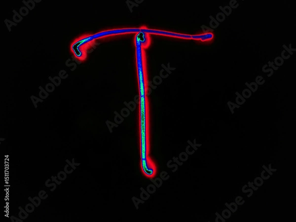 Fototapeta Glowing English letter T. On a black background with colored neon lines, a letter of the English alphabet is written by hand. The letter glows pink-red, creating a green-blue halo around it.