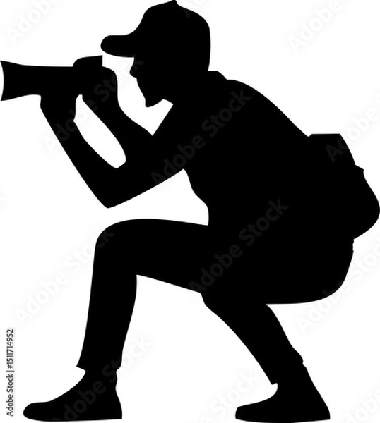 Fototapeta silhouette of a photographer taking pictures