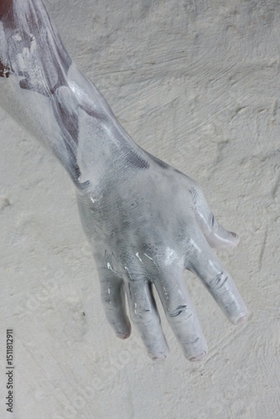 Fototapeta strong active hands working with pottery during the glazing process textured 