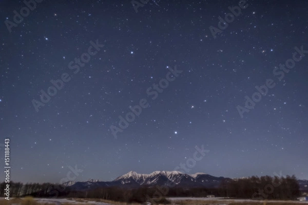 Fototapeta 八ヶ岳に沈むしし座