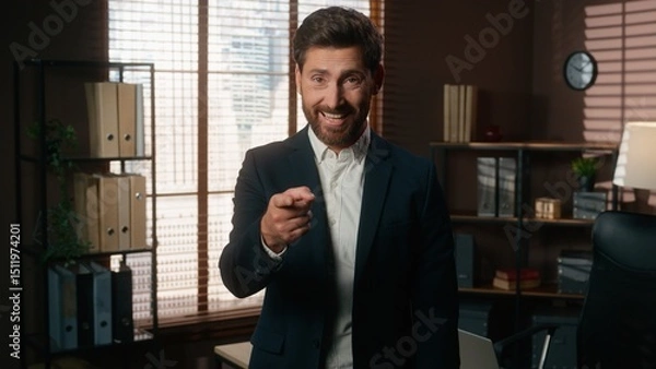 Fototapeta Happy smiling man male recruiter mature businessman index finger hey you gesture pointing at wrist like wristwatch showing time late invite join business team office inviting come here welcome hiring
