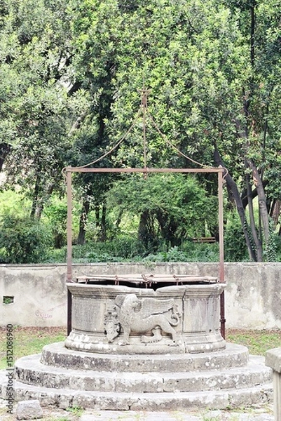 Fototapeta ancient well with the symbol of the Venetian Lion with wings, studies in the park in Zadar