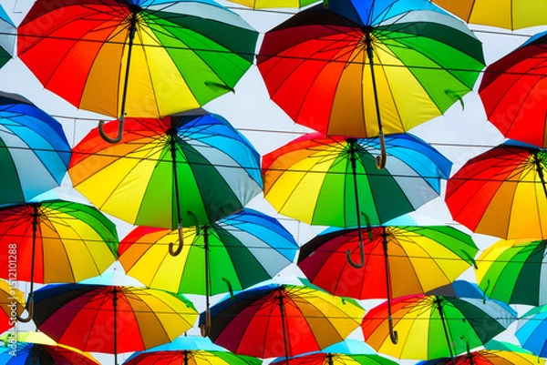 Fototapeta Bright colored umbrellas as a background