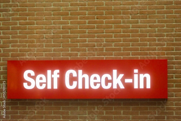 Fototapeta self service check in sign at airport