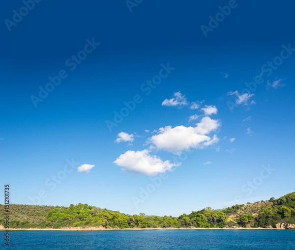 Fototapeta Relief clouds on the turquoise sky