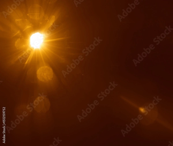 Obraz Sunlight with bokeh behind vertical blinds. Office blinds. Modern metal iron jalousie. Office meeting room lighting range control. Sun rays  beams through the window. Element of design sunrays sunbeam