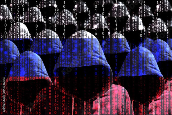Fototapeta Group of hooded hackers shining through a digital russian flag