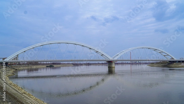 Fototapeta Zezelj bridge, a tied-arch bridge on Danube river in Novi Sad, Vojvodina, Serbia. This structure was opened in 2018. 
