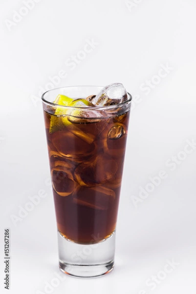 Fototapeta Cuba libre with ice on isolated white background