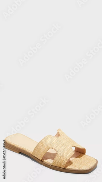 Obraz Stylish woven slide sandals perfect for casual summer outings or beach days