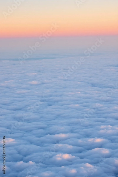 Obraz Aerial View of a Stunning Sunrise Above a Sea of Clouds