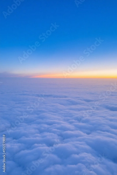 Obraz Stunning Aerial View of Sunrise Above a Sea of Clouds
