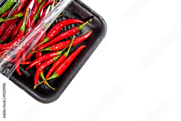 Fototapeta Red chili in foam and plastic package