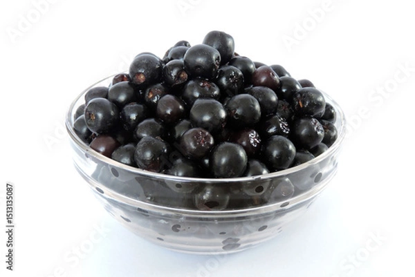 Obraz Fresh ripe aronia berries decorated in a glass bowl, white background