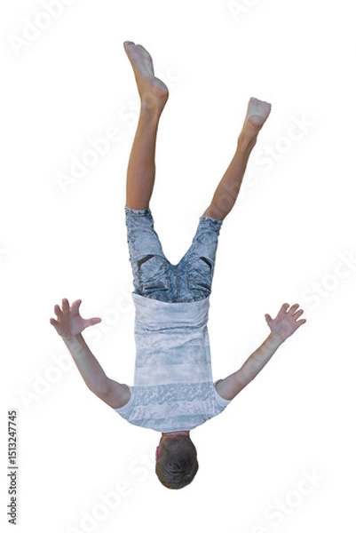 Fototapeta Full length upside down portrait of man falling rear view. Arms and legs spread out on transparent background creates an illusion of floating