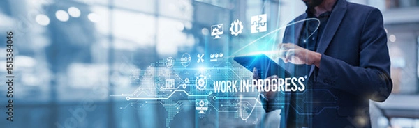 Fototapeta Businessman using tablet analyzing Work In Progress and production growth through efficient resource utilization, and improved cash flow management to enhance profitability and business scalability.