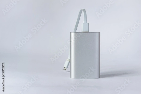 Obraz Szary przenośny akumulator zewnętrzny (power bank) na białym tle na białym tle