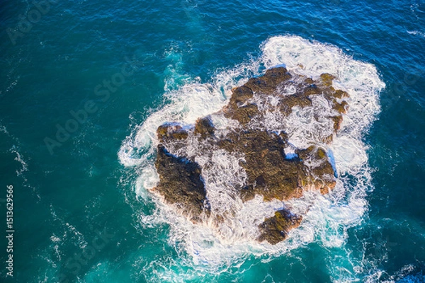 Obraz Powerful surf breaks on beautiful rocks on a small island