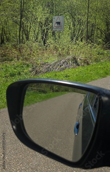 Obraz A road sign from the Bieszczady Mountains, Poland showing a bear with the inscription: Slow down, bears.