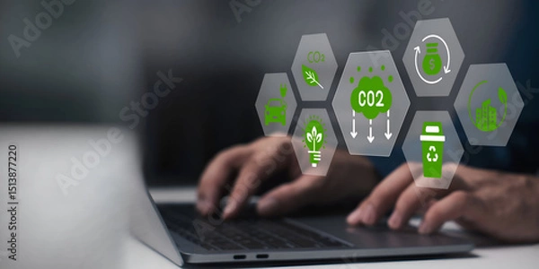Fototapeta A business person using laptop with ESG environment social governance investment business concept, co2 on visual screen.