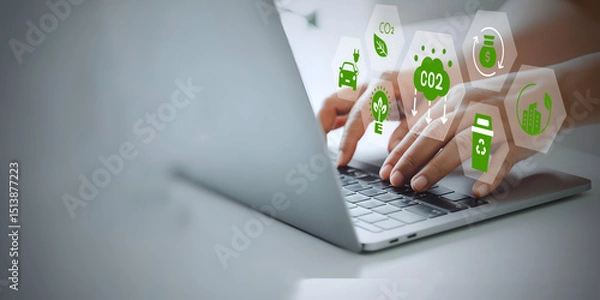 Fototapeta A business person using laptop with ESG environment social governance investment business concept, co2 on visual screen.