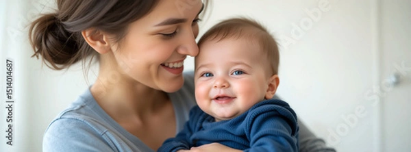 Fototapeta wide closeup photo of mother and a newborn baby smiling with copy space  