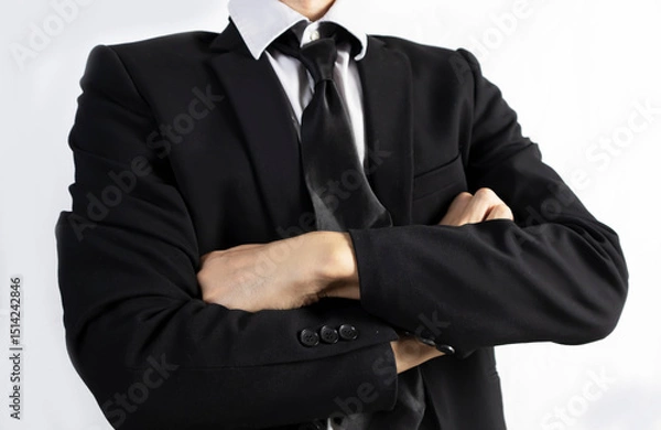 Obraz Businessman in black suit standing showing confidence in business and vision for work