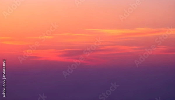 Fototapeta Stunning sunset sky with smooth gradient from soft orange to deep purple and glowing clouds