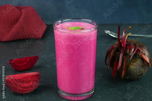 Obraz Serving beetroot smoothie in a glass cup.