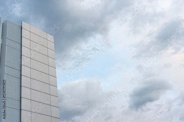 Obraz clouds in the sky with big building